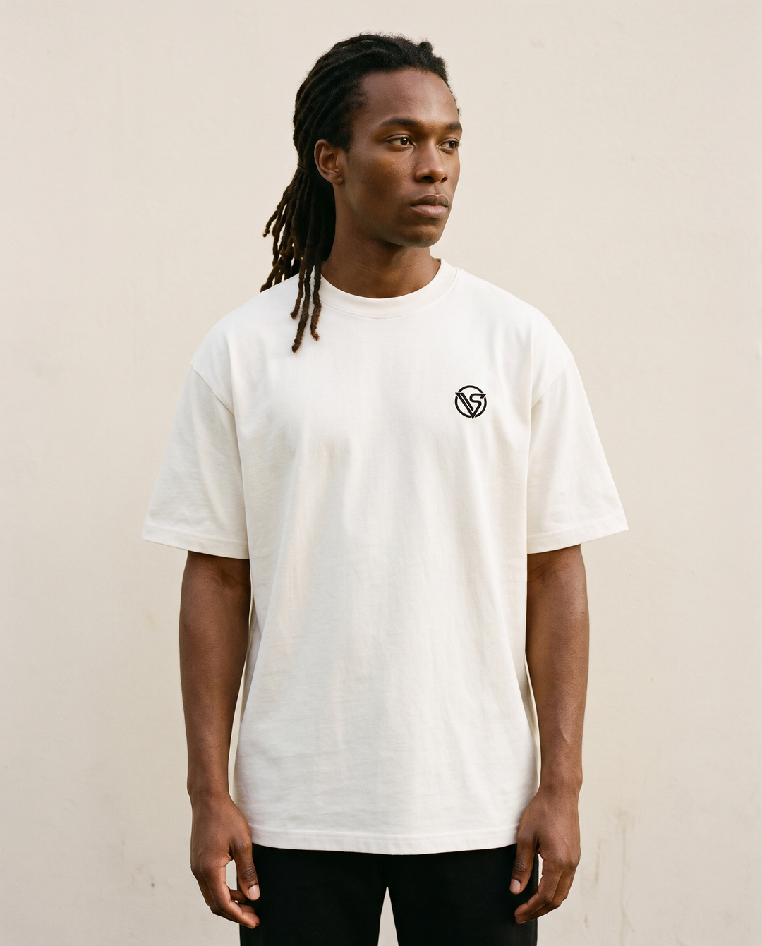 Cream cotton graphic tee lifestyle shot — Visionair Society Meridian Drop 01