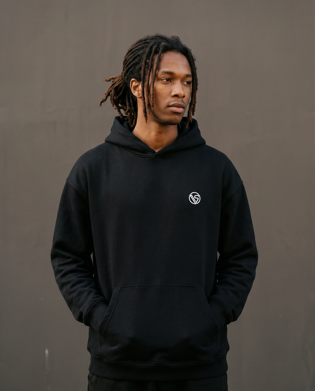 Black cotton hoodie lifestyle shot — Visionair Society Meridian Drop 01